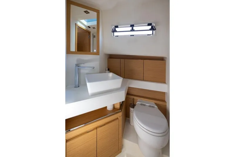 M/y Fizzy Yacht Photos Pics Modern bathroom in 2021 Pardo 43 yacht with sleek fixtures and wooden cabinetry.