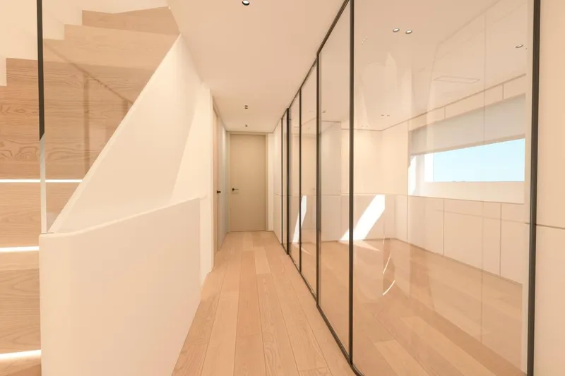  Yacht Photos Pics Modern interior of 2027 Benetti Oasis 40M yacht with glass walls and wooden staircase.