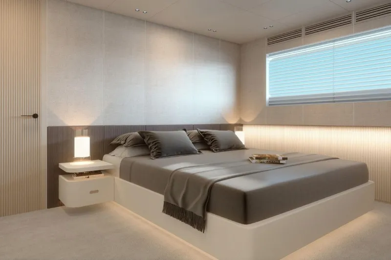  Yacht Photos Pics Luxurious bedroom interior on 2027 Benetti Oasis 40M yacht, featuring modern design and ambient lighting.