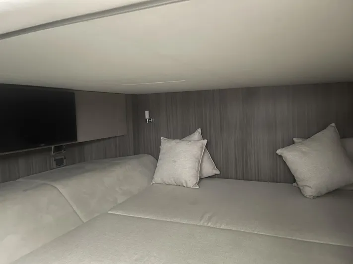 Sea Ray Slx 400 3x Mercury Ob Yacht Photos Pics Interior cabin of 2022 Sea Ray SLX 400 with cozy bedding and modern decor.