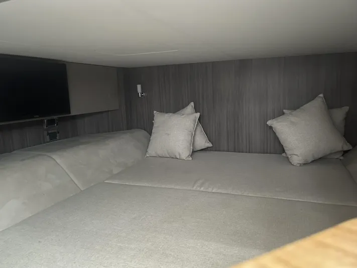 Sea Ray Slx 400 3x Mercury Ob Yacht Photos Pics Interior cabin of 2022 Sea Ray SLX 400 with cozy bedding and pillows.