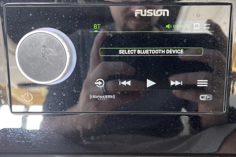 Sea Ray Slx 400 3x Mercury Ob Yacht Photos Pics Fusion audio system interface on a 2022 Sea Ray SLX 400 boat.