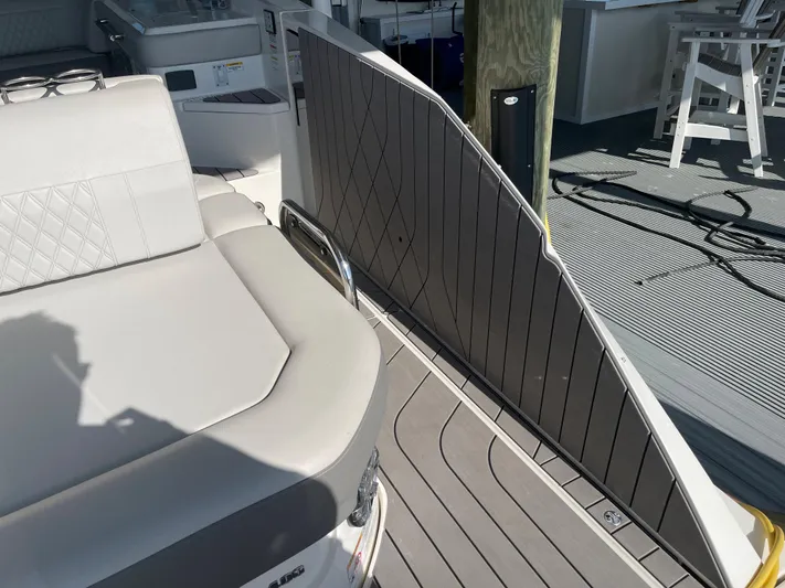 Sea Ray Slx 400 3x Mercury Ob Yacht Photos Pics 2022 Sea Ray SLX 400 boat interior with cushioned seating and sleek deck design.