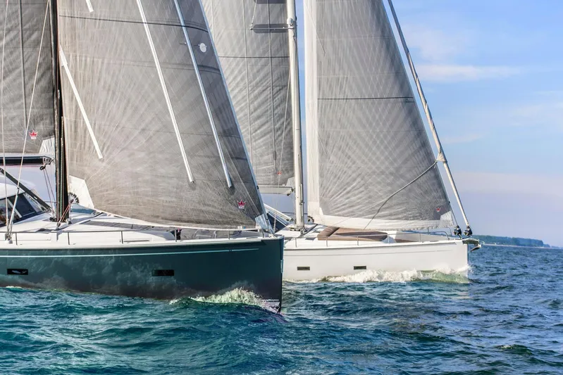  Yacht Photos Pics Sailing yachts Moody DS 54, 2026 model, cruising on open water under clear skies.