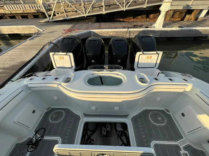 Saltwater Lady Yacht Photos Pics 2016 Yellowfin 42 boat with triple engines docked at marina.