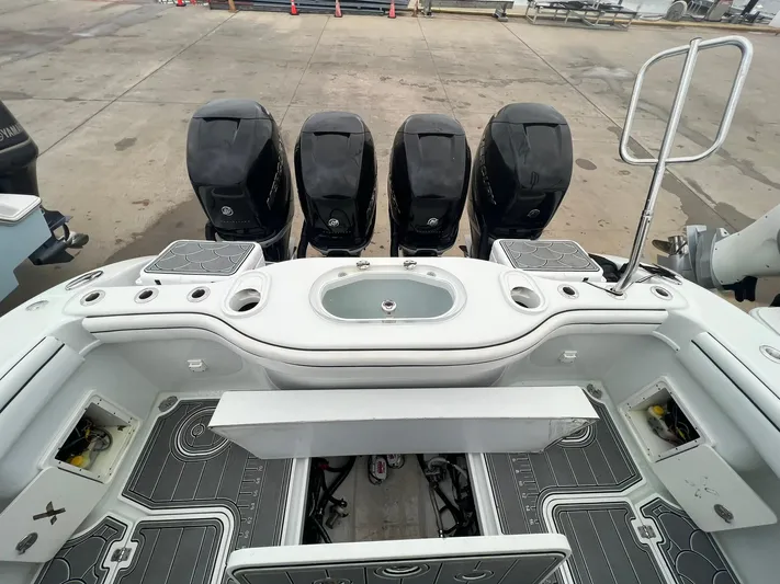 Saltwater Lady Yacht Photos Pics 2016 Yellowfin 42 boat with four powerful outboard engines, spacious deck layout.