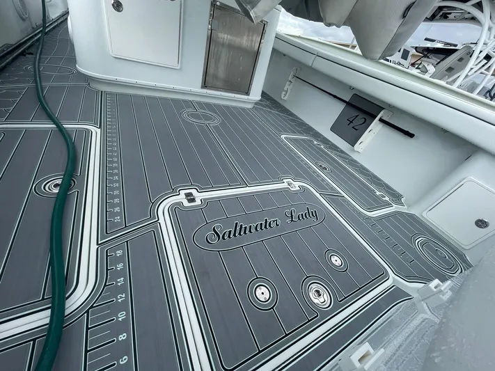 Saltwater Lady Yacht Photos Pics 2016 Yellowfin 42 boat deck with custom "Saltwater Lady" design.