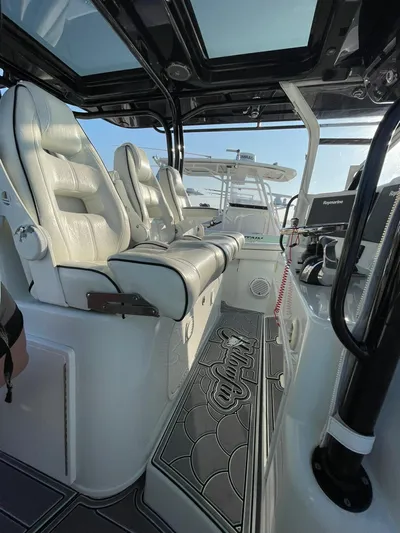 Saltwater Lady Yacht Photos Pics 2016 Yellowfin 42 boat interior with luxurious seating and modern design.