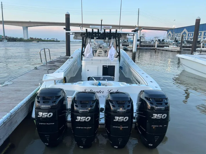 Saltwater Lady Yacht Photos Pics 2016 Yellowfin 42 boat with four 350 horsepower engines docked at marina.