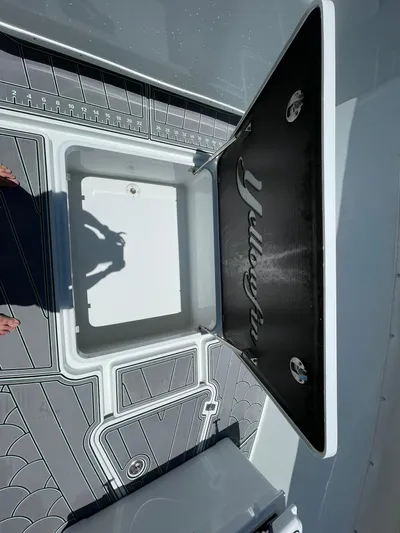 Saltwater Lady Yacht Photos Pics 2016 Yellowfin 42 boat deck with storage compartment open.