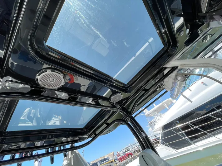 Saltwater Lady Yacht Photos Pics 2016 Yellowfin 42 boat interior with glass roof and speaker system.