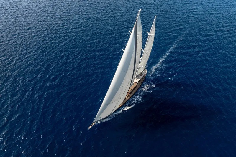 Sallyna Yacht Photos Pics Aerial view of 2023 Su Marine sailing yacht gliding on open sea.