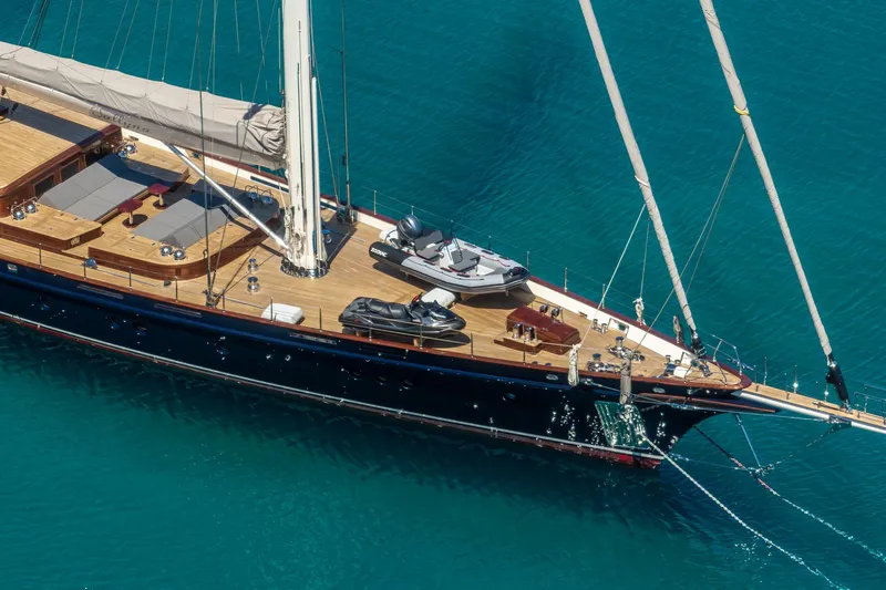 Sallyna Yacht Photos Pics Luxurious 2023 Su Marine sailing yacht with sleek design, anchored in clear blue waters.