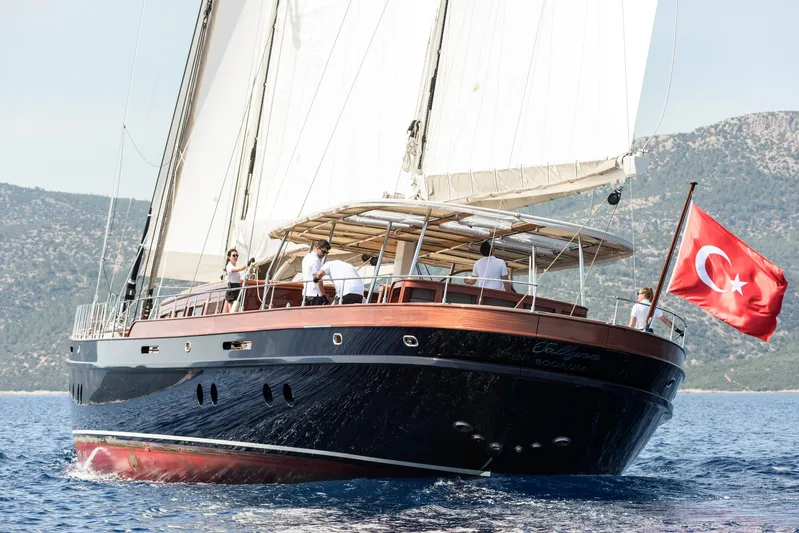 Sallyna Yacht Photos Pics 2023 Su Marine sailing yacht with Turkish flag on open sea.