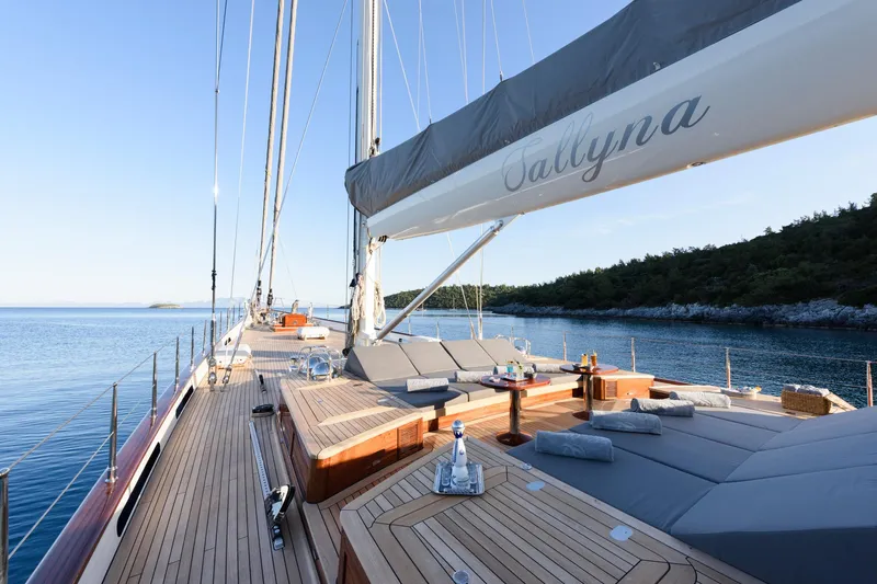 Sallyna Yacht Photos Pics Luxurious 2023 Su Marine sailing yacht with spacious deck and scenic ocean view.