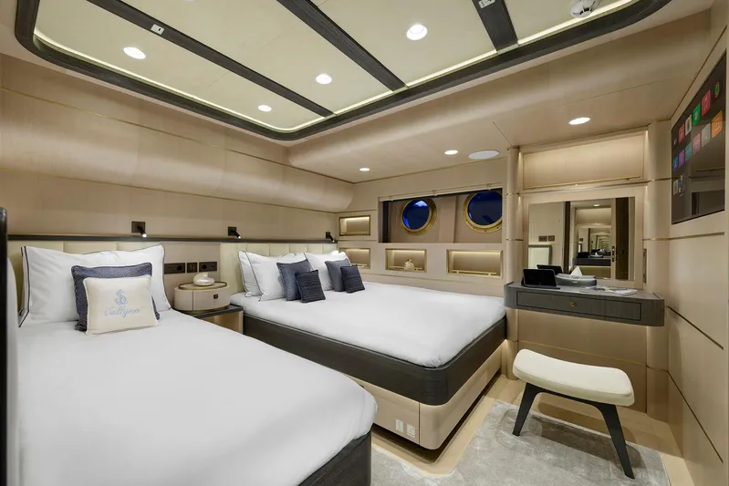 Sallyna Yacht Photos Pics Luxurious 2023 Su Marine sailing yacht cabin with twin beds and elegant decor.