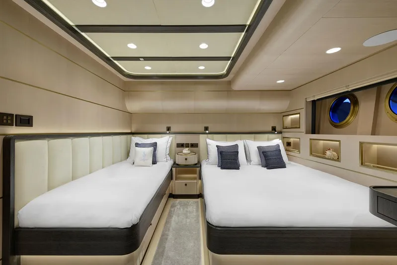 Sallyna Yacht Photos Pics Luxurious 2023 Su Marine sailing yacht bedroom with twin beds and elegant decor.