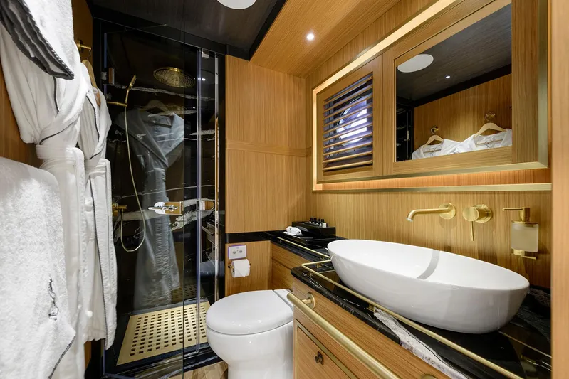 Sallyna Yacht Photos Pics Luxurious 2023 Su Marine sailing yacht bathroom with modern fixtures and elegant wood accents.