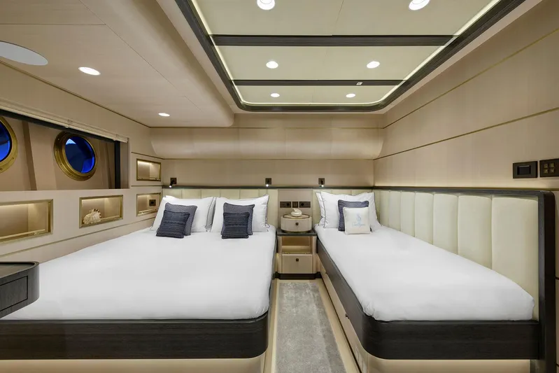 Sallyna Yacht Photos Pics Luxurious 2023 Su Marine sailing yacht bedroom with twin beds and elegant decor.