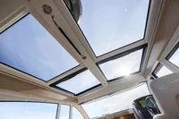 2024 Nimbus 365 Coupe interior with panoramic sunroof and modern design.