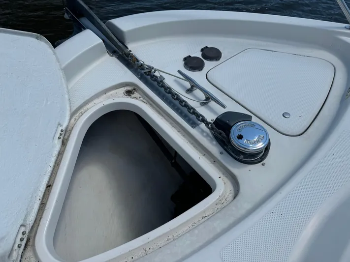 Jjetsdream Yacht Photos Pics 1999 Maxum 4600 SCB boat anchor compartment with chain and winch.
