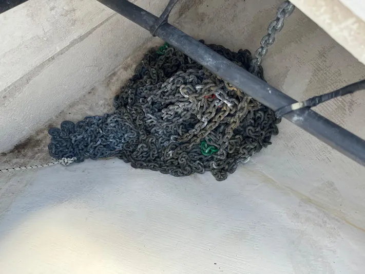 Jjetsdream Yacht Photos Pics Coiled anchor chain in a 1999 Maxum 4600 SCB boat compartment.