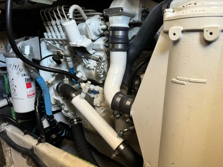 Jjetsdream Yacht Photos Pics Engine compartment of a 1999 Maxum 4600 SCB boat, showcasing mechanical components.