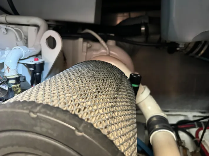 Jjetsdream Yacht Photos Pics Engine compartment of 1999 Maxum 4600 SCB yacht, showing mechanical components.