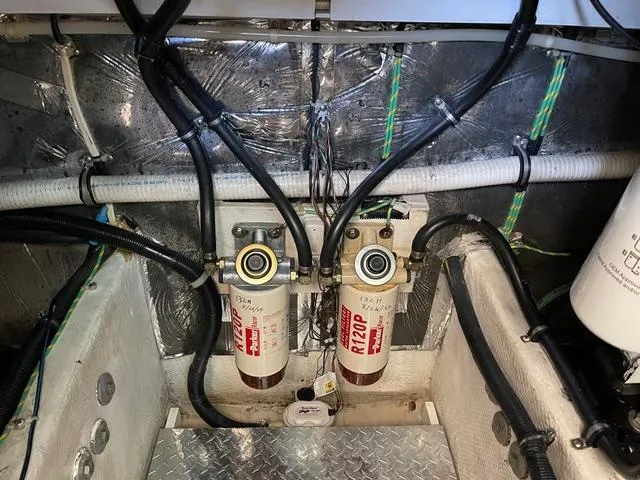 Jjetsdream Yacht Photos Pics Engine room of 1999 Maxum 4600 SCB with fuel filters and wiring.