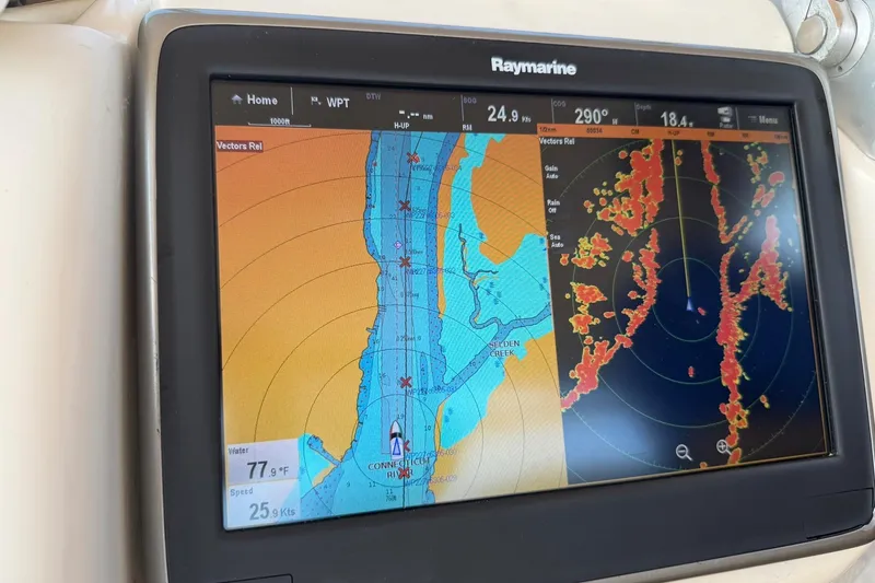 Jjetsdream Yacht Photos Pics Raymarine navigation display on 1999 Maxum 4600 SCB, showing map and radar data.