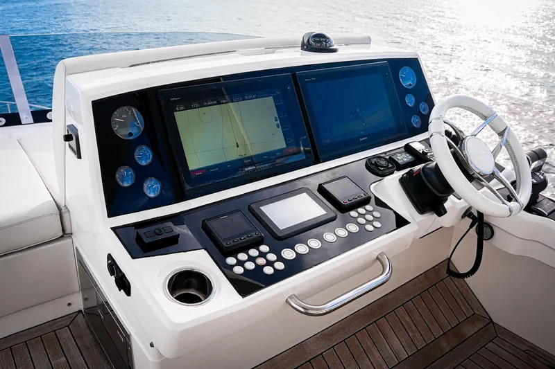 Solaire Yacht Photos Pics 2019 Sunseeker 76 Yacht helm with advanced navigation displays and controls.