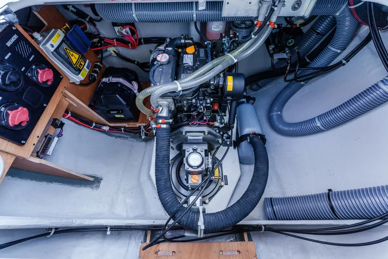 In Stock #169 Yacht Photos Pics 2024 Excess 11 engine room with detailed mechanical components and wiring.