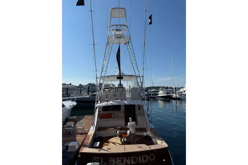  Yacht Photos Pics 2006 Blackwell 66 Convertible yacht docked at marina, rear view.