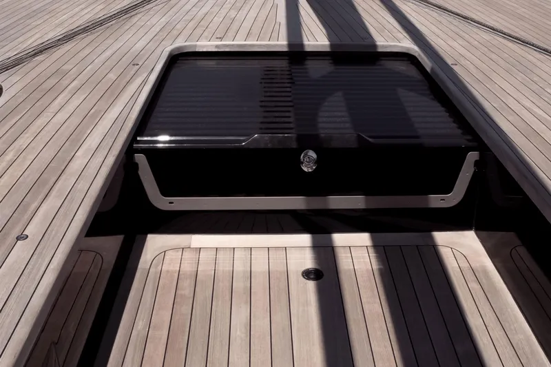 Bullitt Yacht Photos Pics 2018 Wally Custom yacht deck with sleek wooden finish and hatch detail.