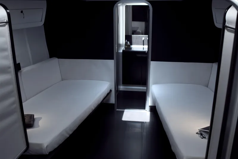 Bullitt Yacht Photos Pics Luxurious interior of 2018 Wally Custom yacht with modern twin beds and sleek design.