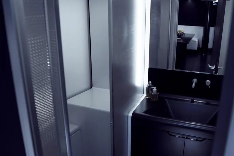 Bullitt Yacht Photos Pics Modern bathroom interior in 2018 Wally Custom yacht, featuring sleek design and lighting.