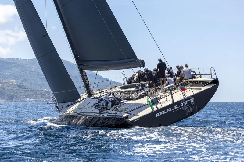 Bullitt Yacht Photos Pics Sailing yacht "Bullit" by Wally, 2018 model, navigating ocean waters with crew onboard.