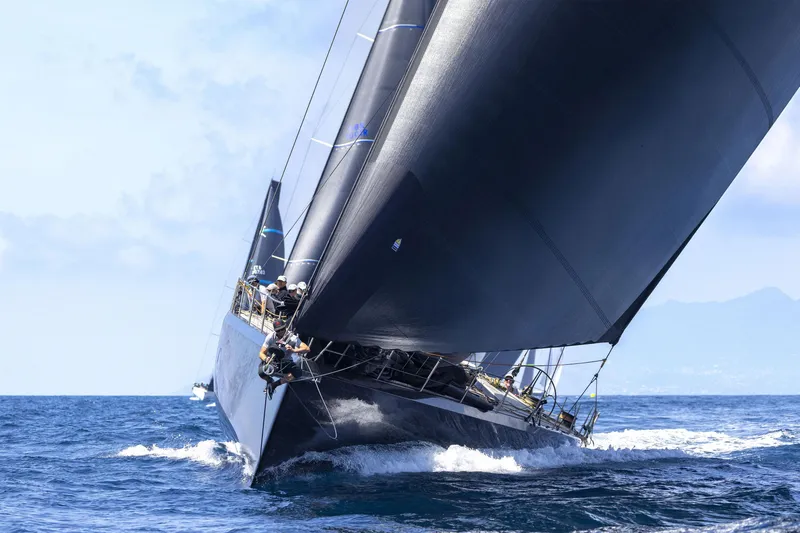 Bullitt Yacht Photos Pics Sleek 2018 Wally Custom yacht sailing on open sea with large sails.