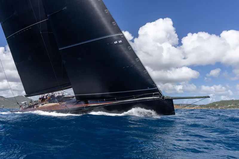 Bullitt Yacht Photos Pics Sleek 2018 Wally Custom yacht sailing on blue ocean under clear sky.