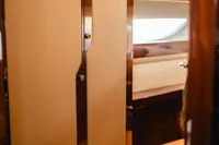 Interior view of 2020 Fairline Targa 45 Open yacht, featuring elegant wood finishes.