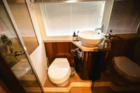 Luxury bathroom in 2020 Fairline Targa 45 Open yacht, featuring modern fixtures and elegant design.