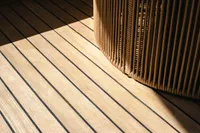 Teak deck and woven furniture detail on 2020 Fairline Targa 45 Open yacht.