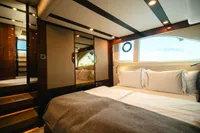 Luxurious interior of 2020 Fairline Targa 45 Open yacht bedroom with elegant design.