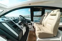 Interior of 2020 Fairline Targa 45 Open yacht with luxurious seating and modern dashboard.