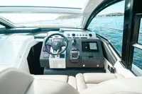 Cockpit of 2020 Fairline Targa 45 Open yacht with modern controls and ocean view.