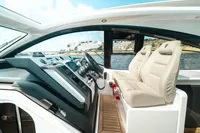 Interior of 2020 Fairline Targa 45 Open yacht with luxurious seating and modern controls.