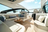Luxurious interior of 2020 Fairline Targa 45 Open yacht with elegant seating and wooden flooring.
