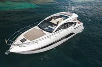 2020 Fairline Targa 45 Open yacht cruising on clear blue water.