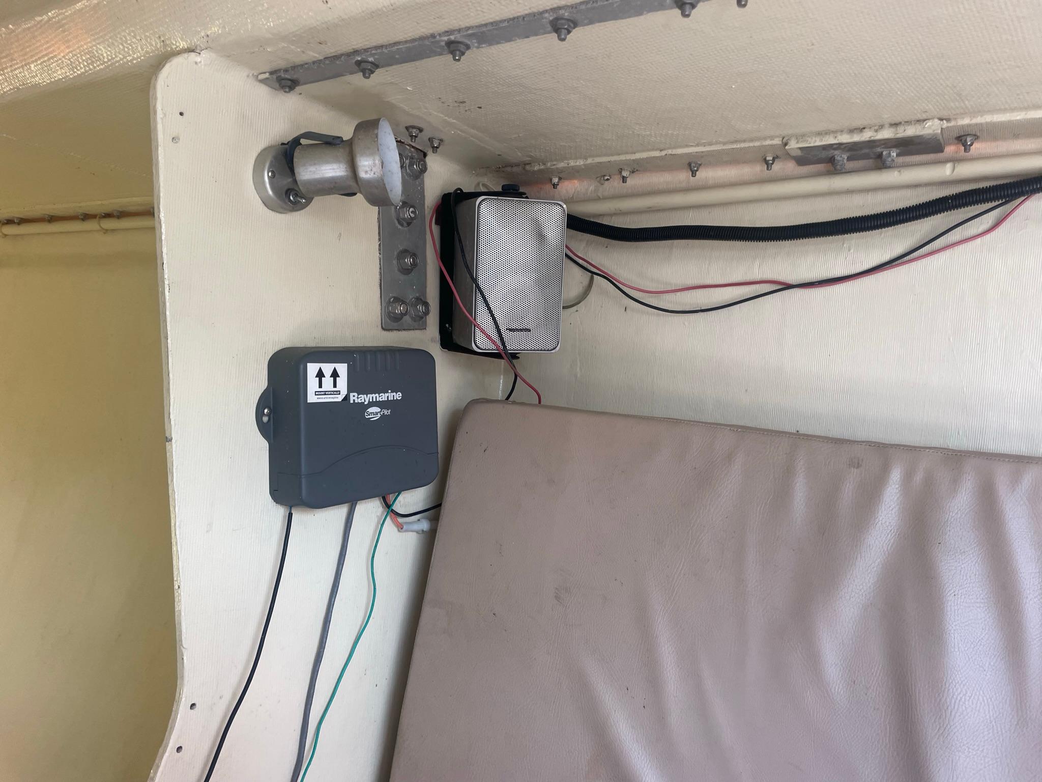 Interior of 1986 Reliance 12m boat with electronic equipment and wiring.