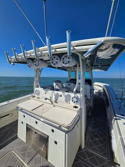  Yacht Photos Pics 2017 HCB 42 Siesta boat with fishing rod holders and speakers.